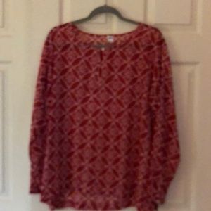 Reddish/orangish blouse